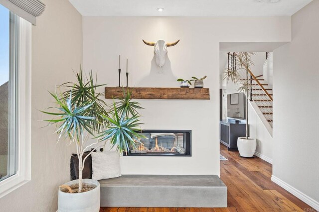 1024 Cottage Way, Encinitas, CA 92024 - hallway with stairway, wood finished floors, baseboards, and recessed lighting