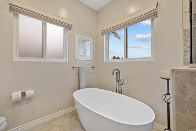 1024 Cottage Way, Encinitas, CA 92024 - bathroom with baseboards and a freestanding tub