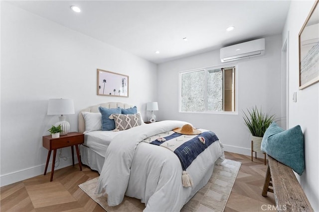 bedroom featuring a wall mounted air conditioner, recessed lighting, and baseboards