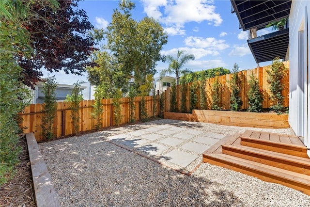 view of patio featuring fence