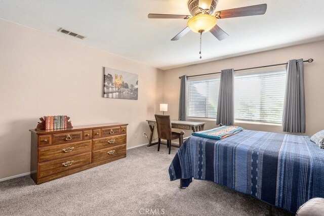 11530 Oak St, Apple Valley, CA 92308 - bedroom with carpet floors, baseboards, and a ceiling fan