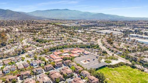 drone / aerial view featuring a mountain view and a residential view