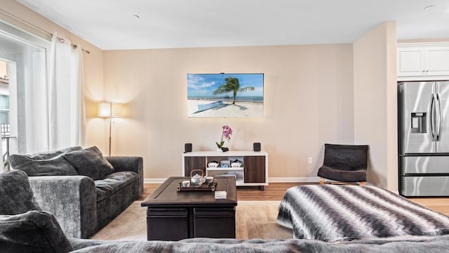 1771 Laurelwood Way, Oceanside, CA 92056 - living area featuring light wood-type flooring and baseboards
