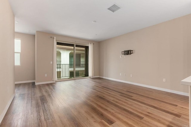 1771 Laurelwood Way, Oceanside, CA 92056 - empty room with wood finished floors and baseboards