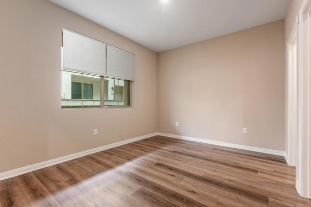 1771 Laurelwood Way, Oceanside, CA 92056 - empty room featuring baseboards and wood finished floors