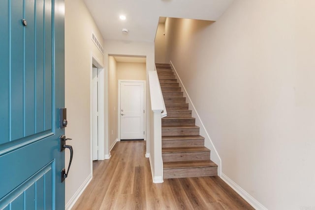 1771 Laurelwood Way, Oceanside, CA 92056 - entryway with light wood-style floors and stairs