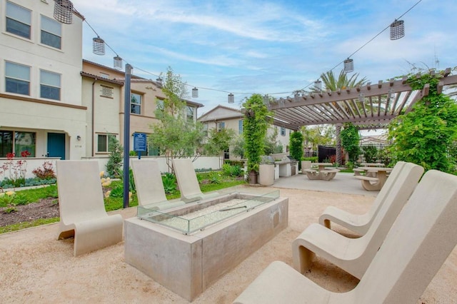 1771 Laurelwood Way, Oceanside, CA 92056 - view of patio featuring an outdoor fire pit and a pergola