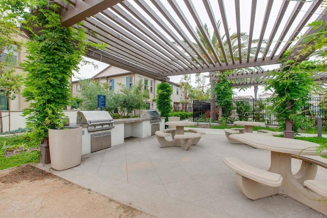 1771 Laurelwood Way, Oceanside, CA 92056 - view of patio with exterior kitchen and a pergola