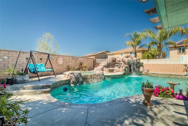 25279 Spur Branch Pl, Menifee, CA 92584 - view of swimming pool featuring a fenced backyard, a patio area, and a pool with connected hot tub