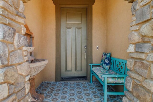 25279 Spur Branch Pl, Menifee, CA 92584 - entrance to property with stone siding