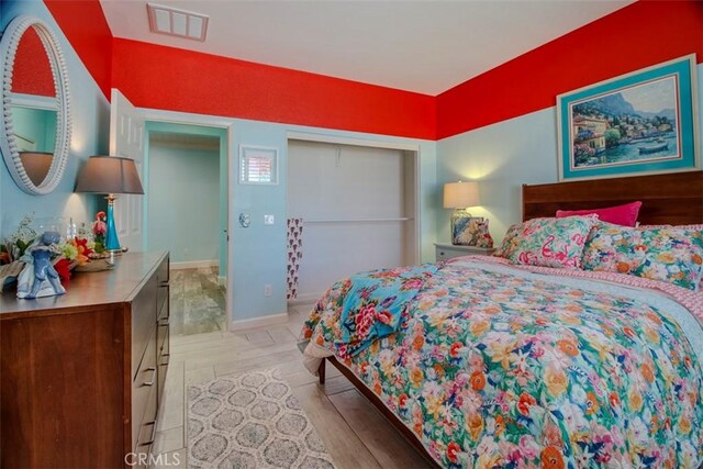 25279 Spur Branch Pl, Menifee, CA 92584 - bedroom with light wood-style floors and baseboards