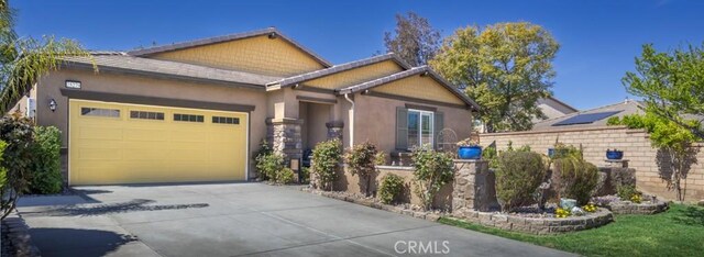 25279 Spur Branch Pl, Menifee, CA 92584 - craftsman house featuring a garage, driveway, and stucco siding