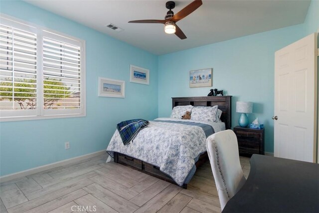 25279 Spur Branch Pl, Menifee, CA 92584 - bedroom with baseboards and a ceiling fan