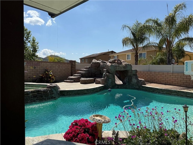 25279 Spur Branch Pl, Menifee, CA 92584 - view of pool featuring a fenced backyard and a pool with connected hot tub