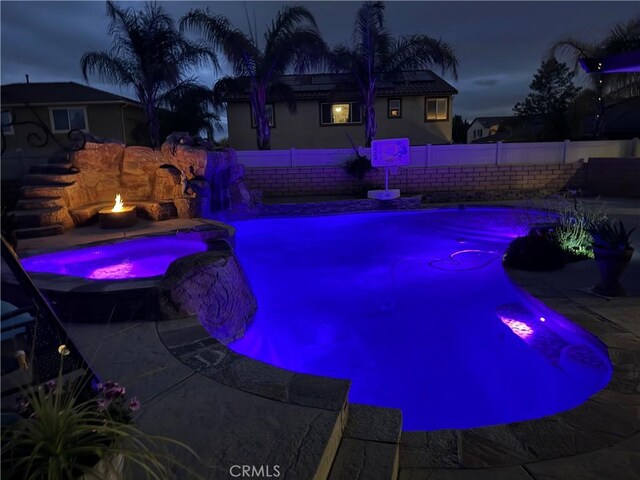 25279 Spur Branch Pl, Menifee, CA 92584 - view of pool with a fenced backyard and a pool with connected hot tub