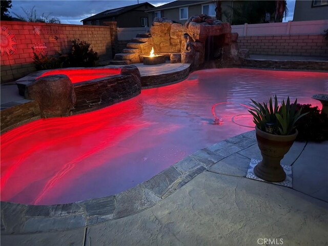 25279 Spur Branch Pl, Menifee, CA 92584 - view of pool featuring a fenced backyard and a pool with connected hot tub