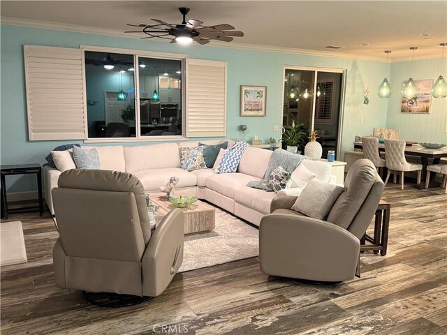 25279 Spur Branch Pl, Menifee, CA 92584 - living room with ornamental molding, wood finished floors, and a ceiling fan