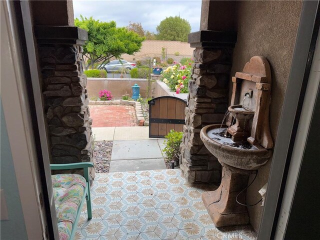 25279 Spur Branch Pl, Menifee, CA 92584 - view of patio with a gate