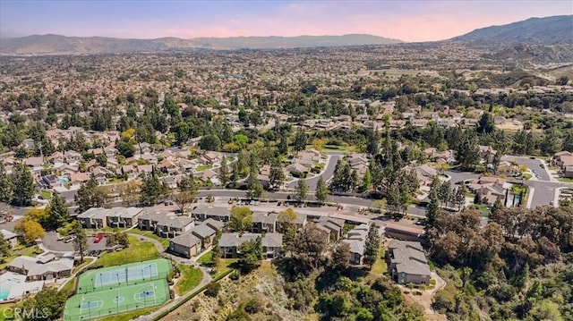 aerial view featuring a mountain view and a residential view