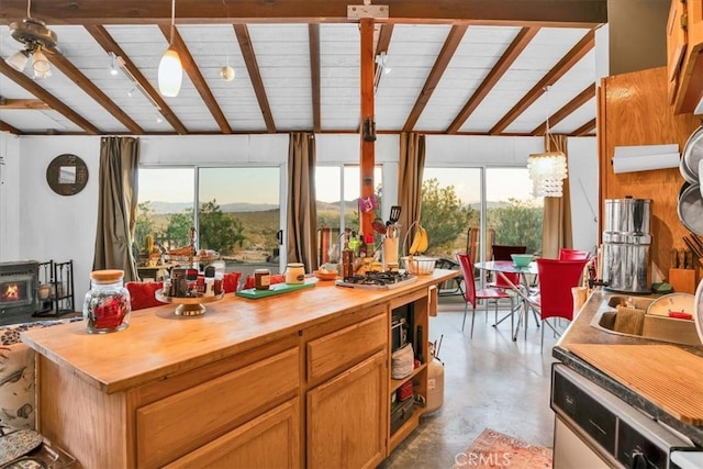 63854 Orion Rd, Joshua Tree, CA 92252 - kitchen with wood counters, finished concrete flooring, plenty of natural light, and ceiling fan