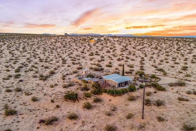 63854 Orion Rd, Joshua Tree, CA 92252 - aerial view at dusk of view of desert, a rural view, and a mountain view