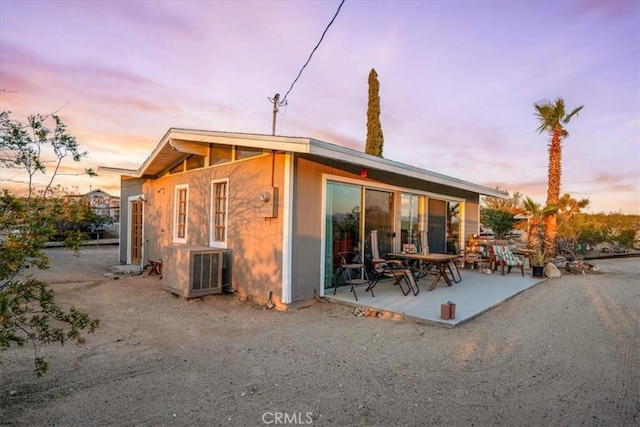 63854 Orion Rd, Joshua Tree, CA 92252 - back of house featuring a patio area