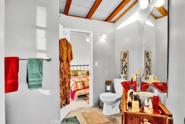 63854 Orion Rd, Joshua Tree, CA 92252 - bathroom with toilet, ensuite bath, and concrete flooring