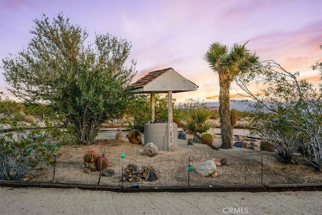 63854 Orion Rd, Joshua Tree, CA 92252 - view of yard at dusk