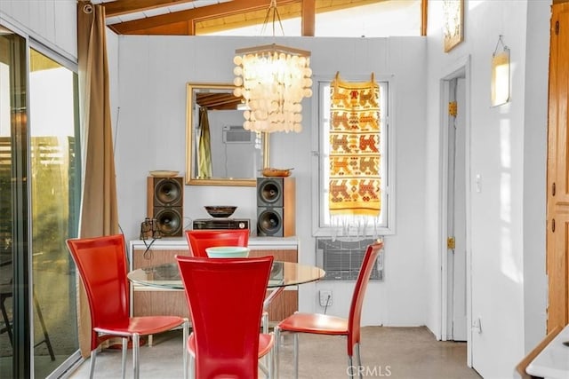 63854 Orion Rd, Joshua Tree, CA 92252 - dining area with a chandelier and concrete flooring
