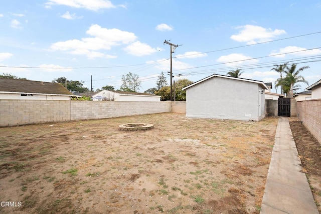 1257 S G St, Oxnard, CA 93033 - view of yard with a fenced backyard and a fire pit
