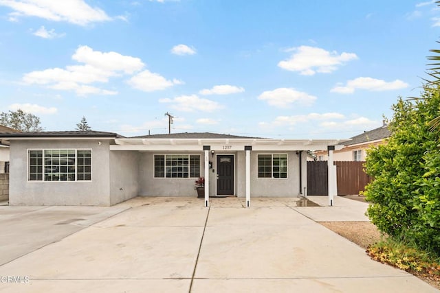 1257 S G St, Oxnard, CA 93033 - ranch-style house featuring a patio, fence, and stucco siding