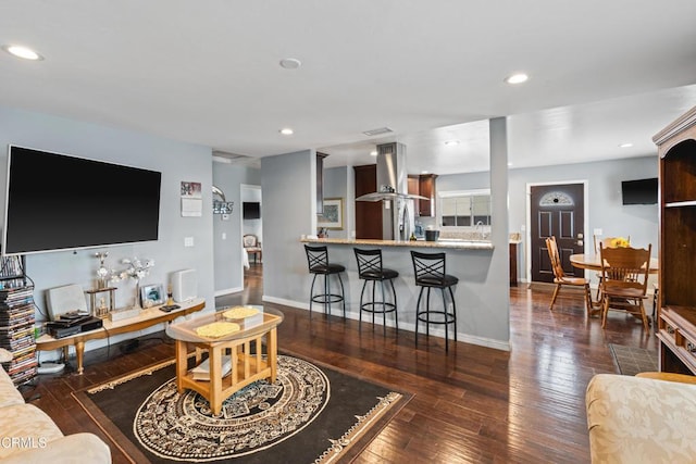 1257 S G St, Oxnard, CA 93033 - living area featuring wood-type flooring, recessed lighting, and baseboards