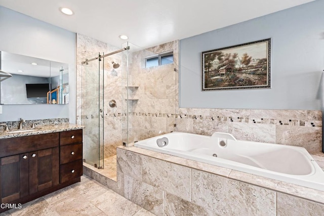 1257 S G St, Oxnard, CA 93033 - bathroom with vanity, recessed lighting, a bath, and a stall shower