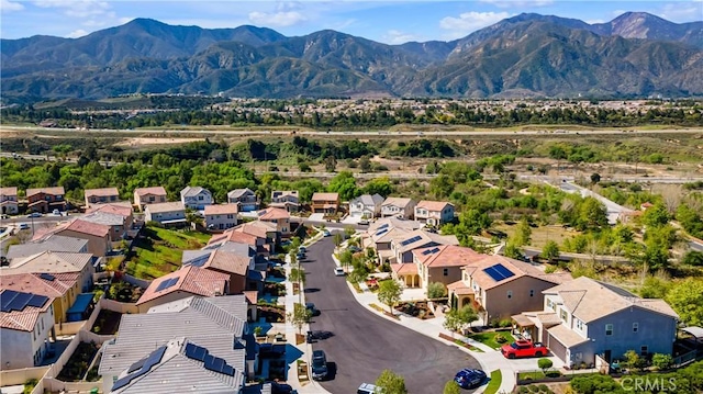 birds eye view of property featuring a residential view and a mountain view
