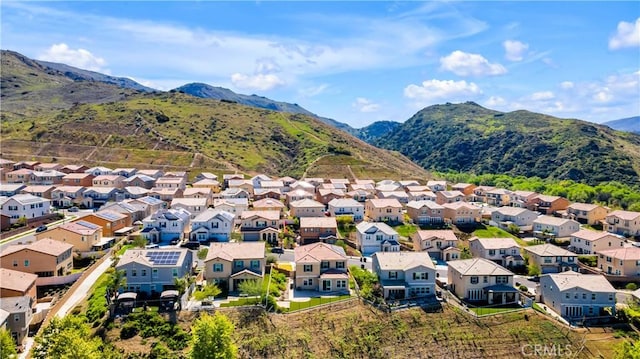 aerial view with a mountain view and a residential view