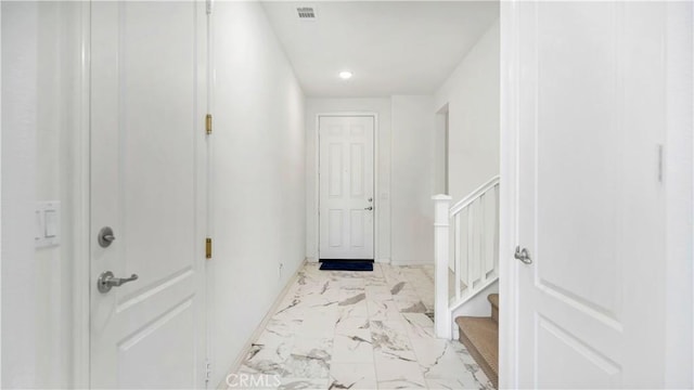 hall with recessed lighting, marble finish floor, visible vents, stairs, and baseboards