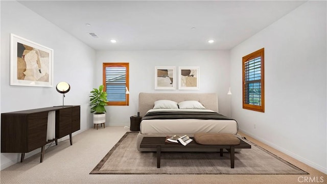 bedroom with baseboards, visible vents, carpet flooring, and recessed lighting