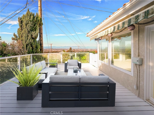 deck with an outdoor hangout area