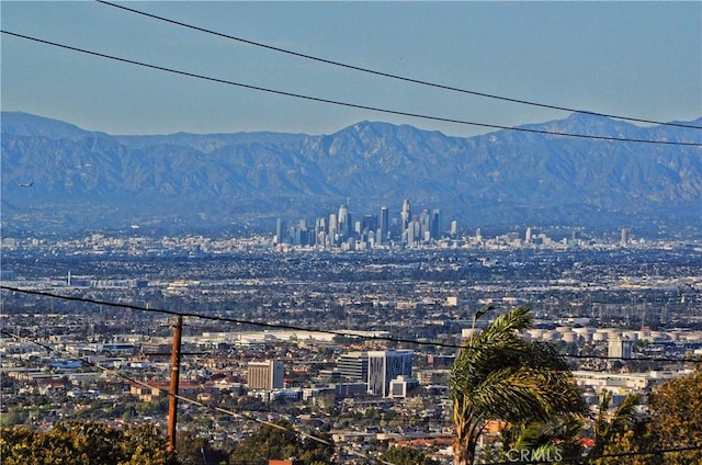 mountain view featuring a city view