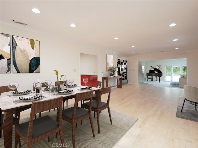 dining space featuring crown molding, visible vents, and recessed lighting