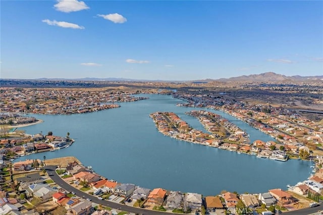 aerial view featuring a residential view and a water and mountain view