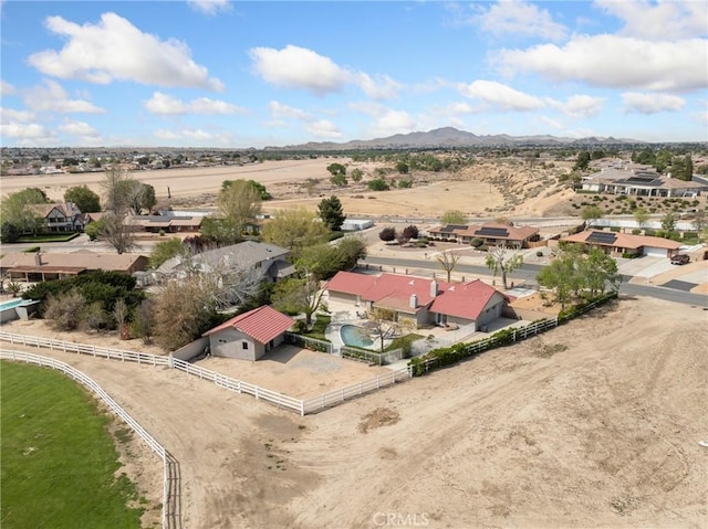 drone / aerial view with a mountain view and a residential view
