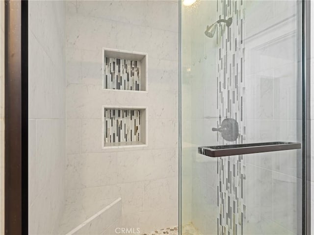 full bathroom featuring a shower stall