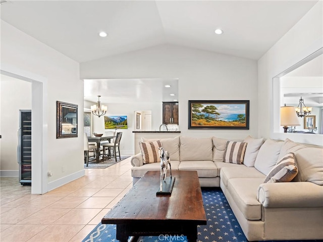 living room with light tile patterned floors, baseboards, a chandelier, recessed lighting, and vaulted ceiling