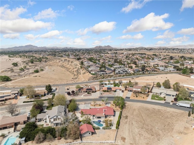 bird's eye view featuring a mountain view and a residential view