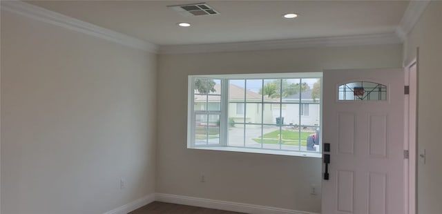 foyer entrance featuring recessed lighting, crown molding, visible vents, baseboards, and wood finished floors