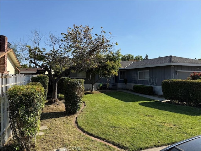 view of yard with fence