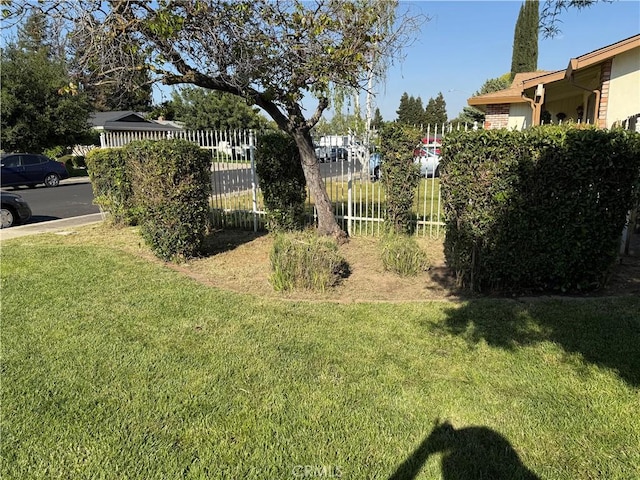 view of yard featuring fence