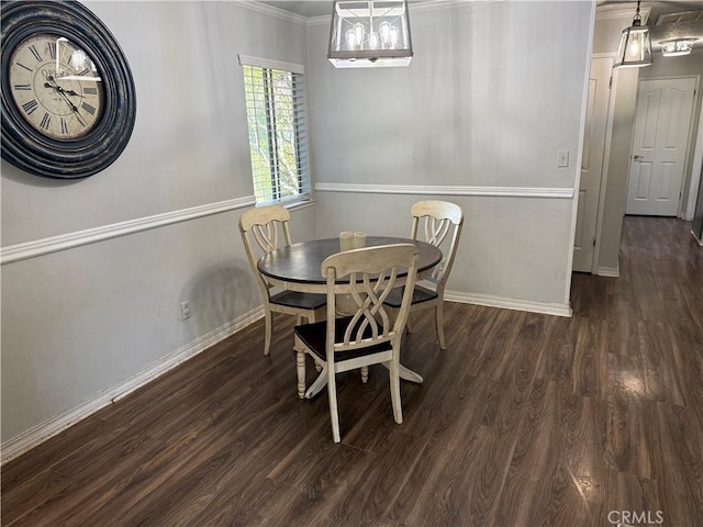 500 Sherri Way, Turlock, CA 95382 - dining area with baseboards, dark wood-style floors, and ornamental molding