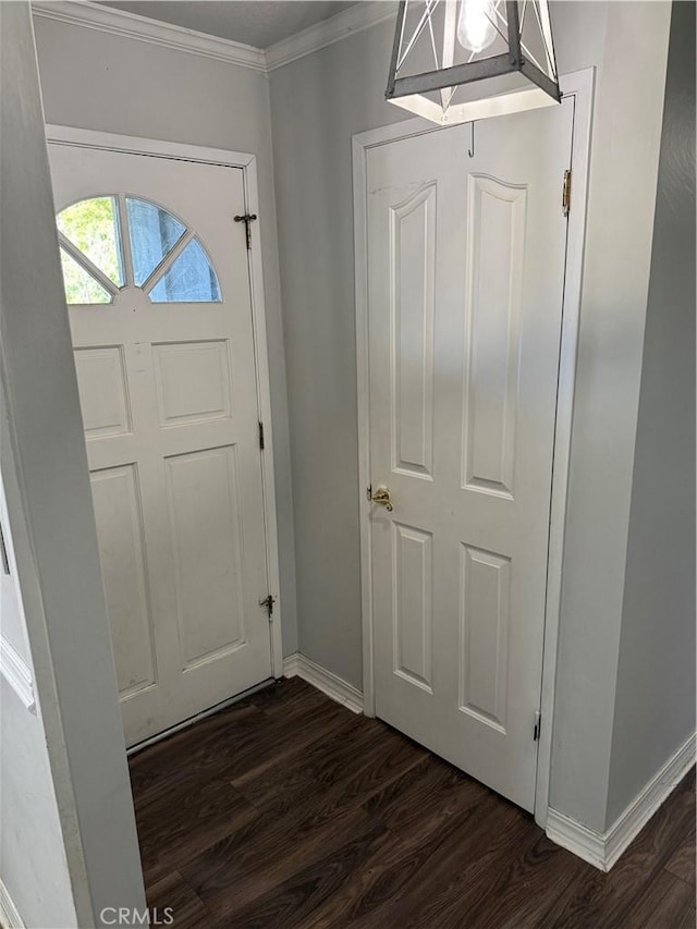 500 Sherri Way, Turlock, CA 95382 - foyer entrance with ornamental molding, baseboards, and dark wood-style flooring